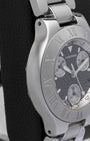 Polished and brushed left side profile of the 38mm stainless steel case on a Cartier Must 21 Chronoscaph resting on a leather display cushion