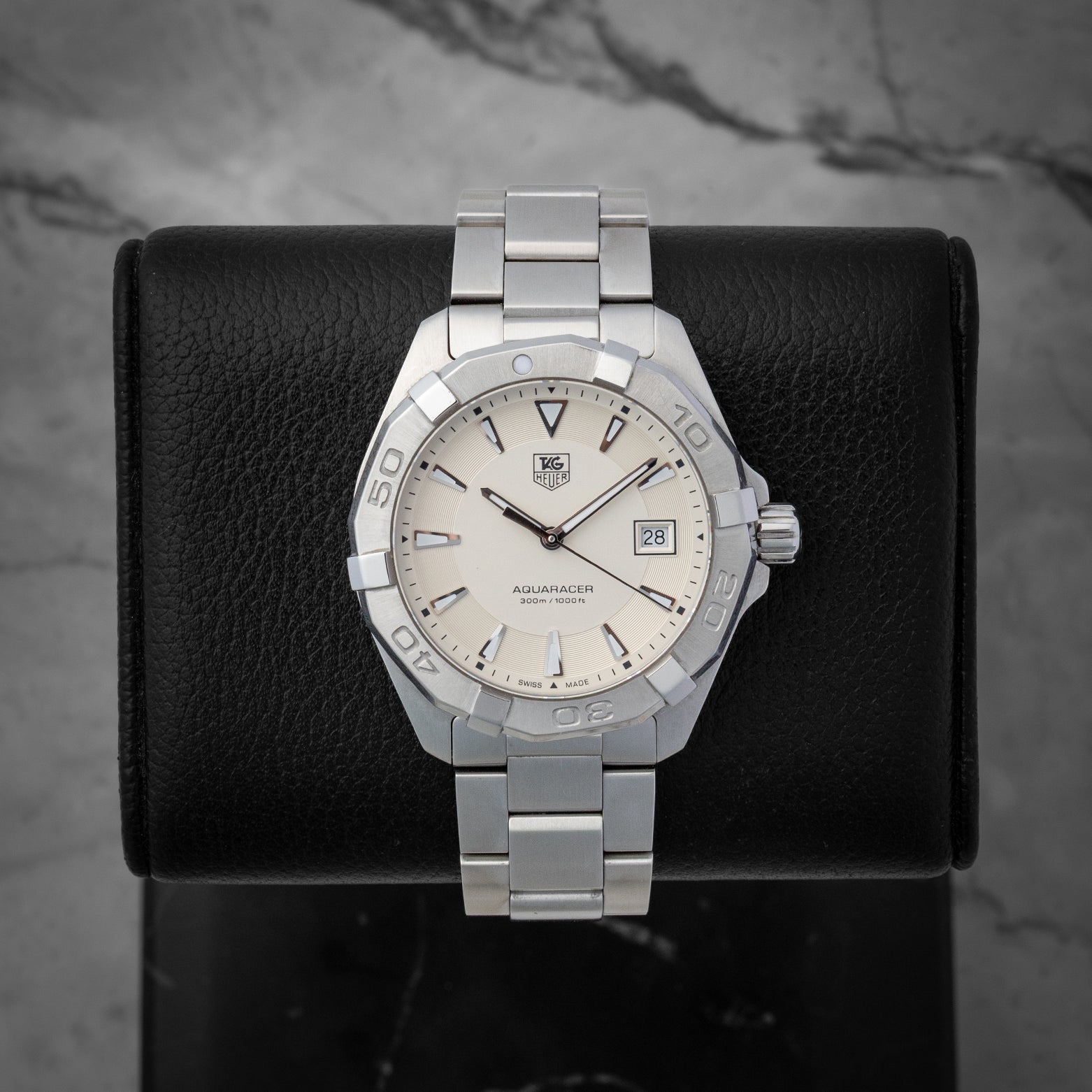 TAG Heuer Aquaracer 300M quartz 41mm dive watch with a silver dial, model WAY1111, on display at Noah's Fine Watches & Jewelry in Dallas