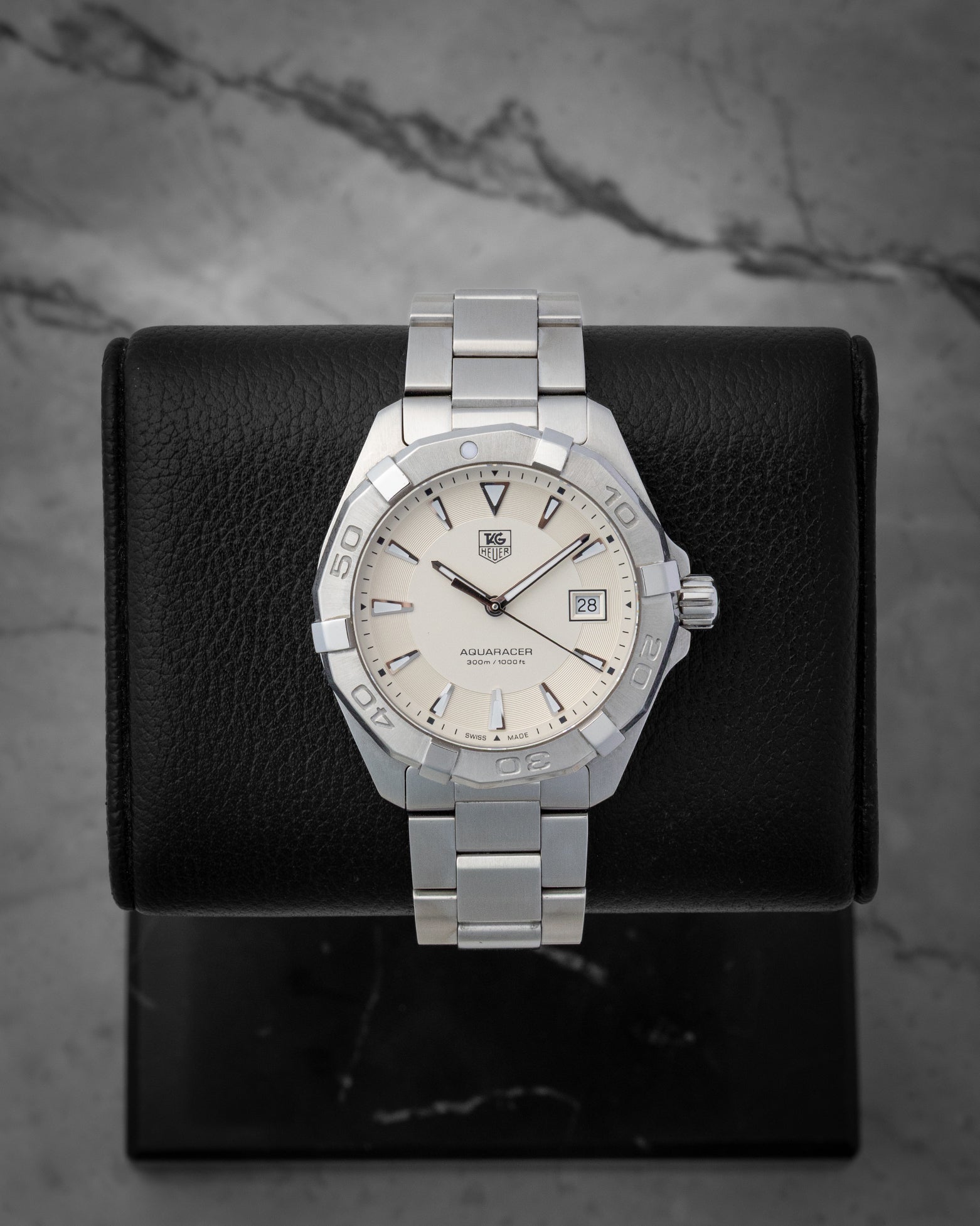 TAG Heuer Aquaracer 300M quartz 41mm dive watch with a silver dial, model WAY1111, on display at Noah's Fine Watches & Jewelry in Dallas