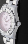 Macro case profile showing the unidirectional rotating dive bezel ridges and the heavy-duty screw-down crown on a 300m waterproof steel ladies watch