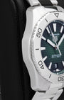 Side profile view of the polished and brushed stainless steel case on the non-crown side of a TAG Heuer Aquaracer Professional 200