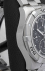 Left side case profile showcasing the thick polished and fine-brushed stainless steel finish of the 42mm TAG Heuer Aquaracer chronograph