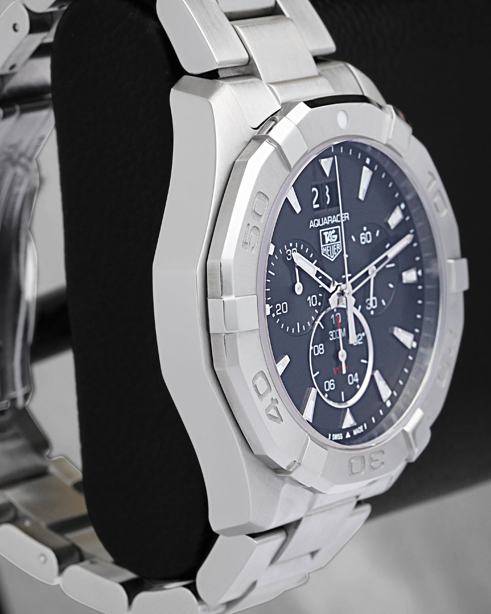 Left side case profile showcasing the polished and fine-brushed stainless steel finish of the 43mm TAG Heuer Aquaracer chronograph