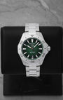 TAG Heuer Aquaracer Professional 200 Date WBP2115.BA0627 featuring a smoky green dial on a black display stand
