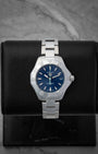 TAG Heuer Aquaracer Professional 200 Solargraph 34mm watch with a blue dial, model WBP1311, on display at Noah's Fine Watches & Jewelry in Dallas
