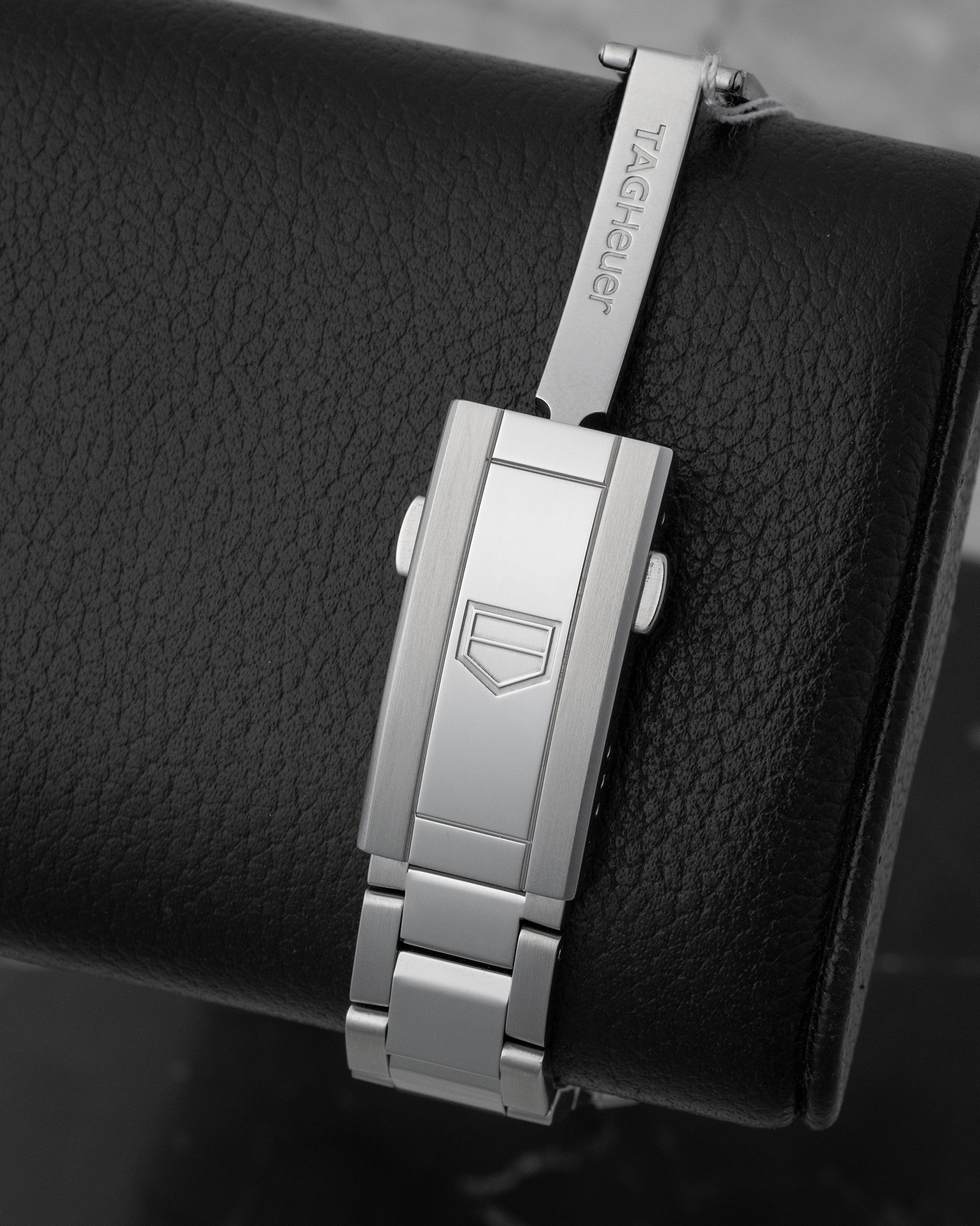 TAG Heuer stainless steel three-row watch bracelet and folding clasp with double safety push-buttons