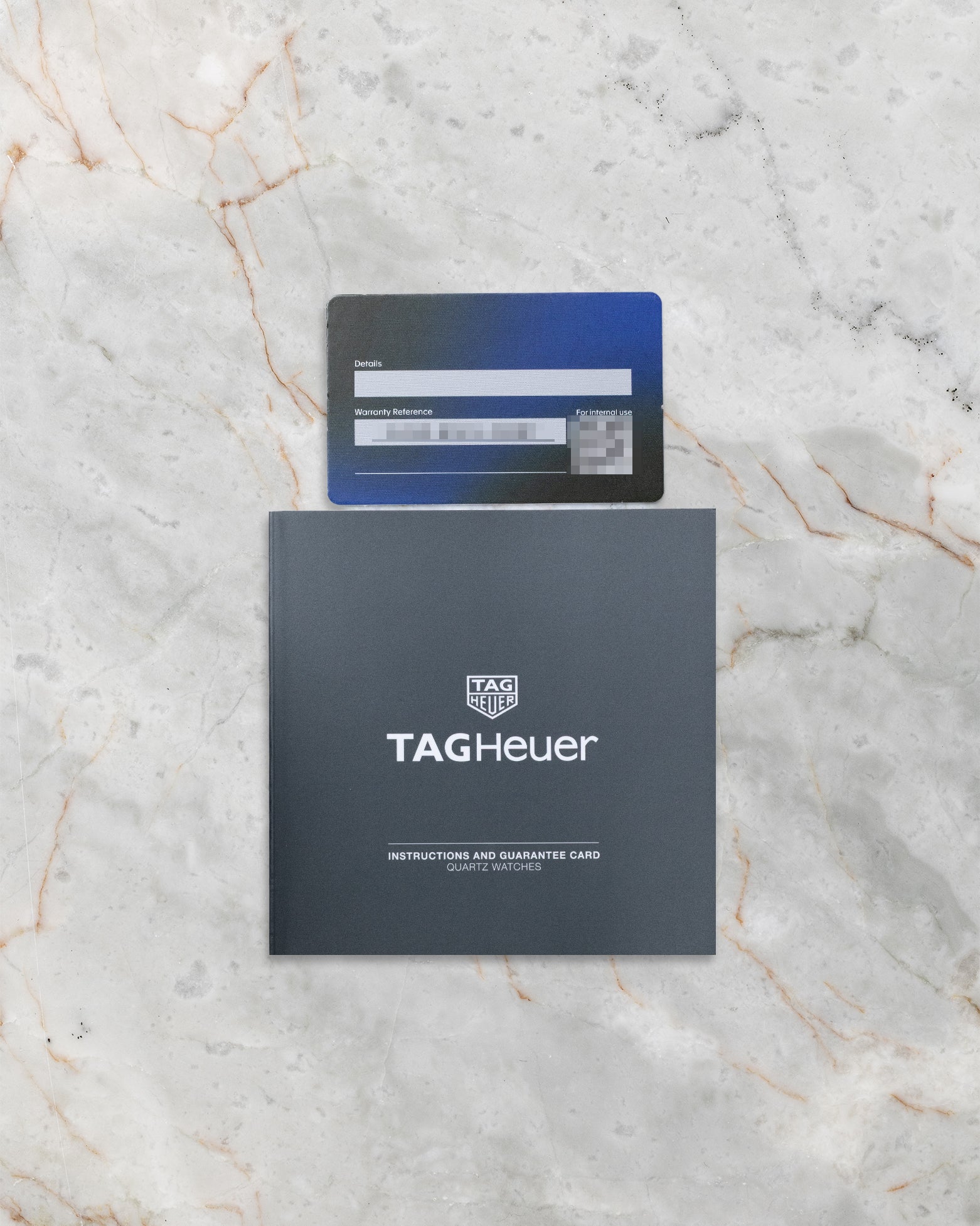TAG Heuer Aquaracer Solargraph reference WBP1311 official warranty card and user manual at Noah's Fine Watches & Jewelry