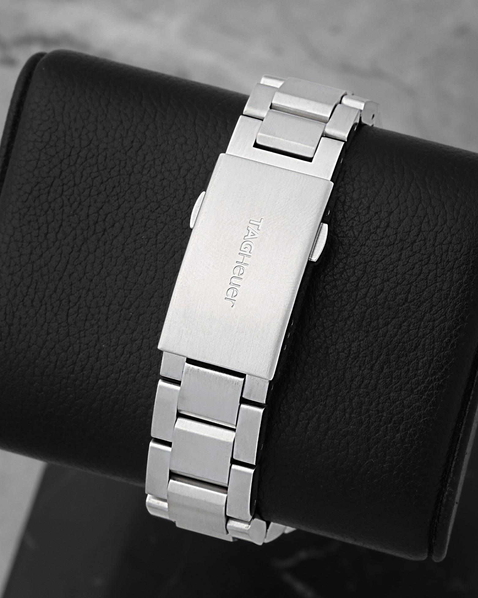 TAG Heuer stainless steel watch bracelet and folding deployment clasp with safety extensions and engraved branding