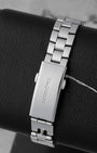Rear view of the brushed three-link BA0824 steel bracelet secured with a folding deployment safety clasp stamped with the signature TAG Heuer brand lettering