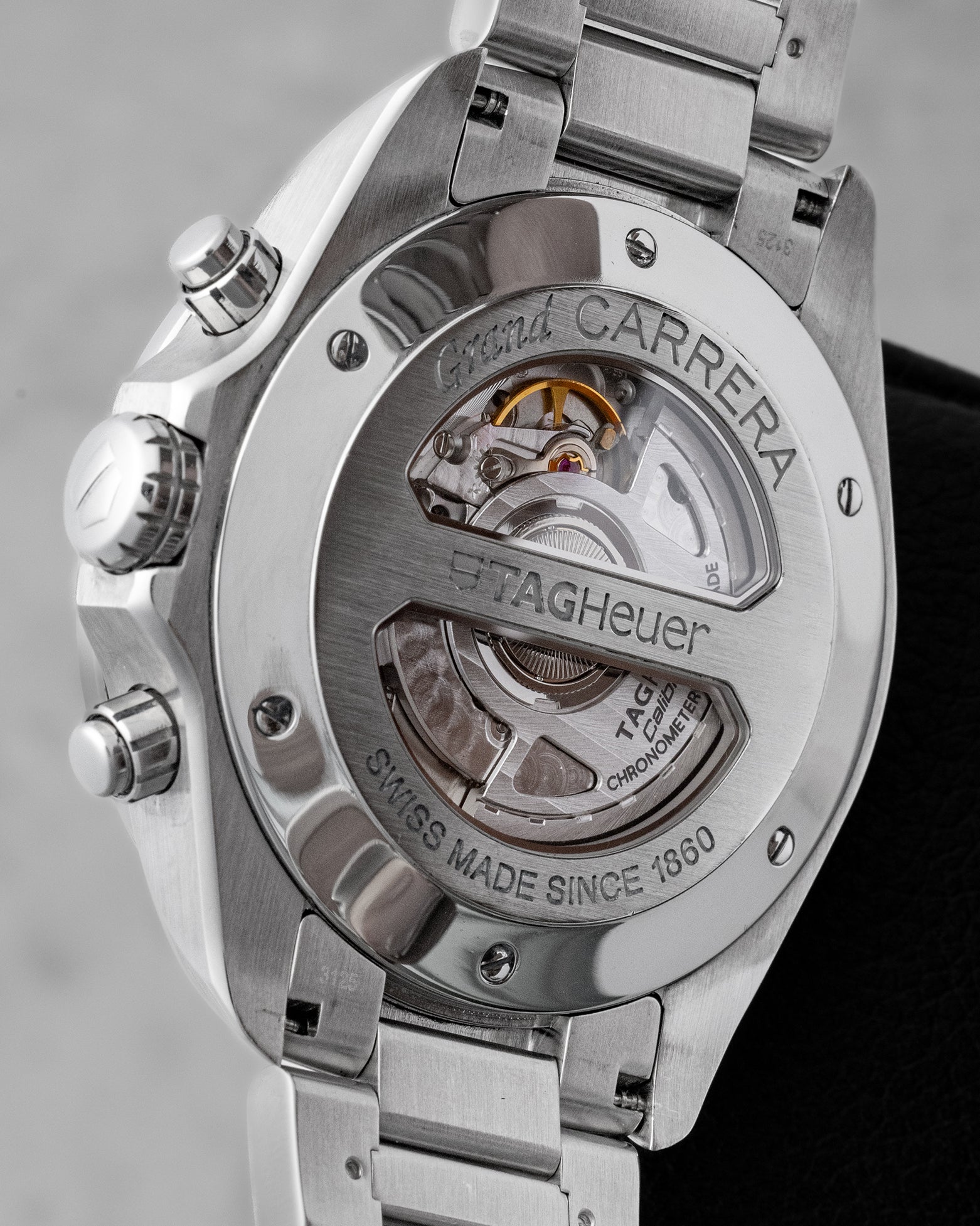 The split sapphire crystal exhibition caseback of a TAG Heuer Grand Carrera displaying the COSC certified Swiss automatic Calibre 17 movement