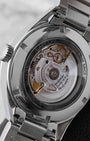 The sapphire crystal exhibition caseback of a TAG Heuer Carrera displaying the Swiss automatic Calibre 5 movement and rotor