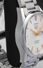 Side profile view of the polished and brushed stainless steel case on the non-crown side of a TAG Heuer Carrera 41mm