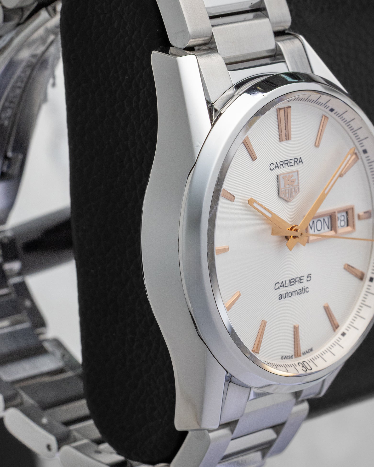 Side profile view of the polished and brushed stainless steel case on the non-crown side of a TAG Heuer Carrera 41mm