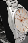 Left-side macro profile view showcasing the fine satin-brushed finish across the caseband wall and the signature sharp, faceted Carrera angular lugs