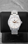 TAG Heuer Carrera Calibre 5 Day-Date watch WAR201D featuring a silver dial with rose gold accents on a black display stand