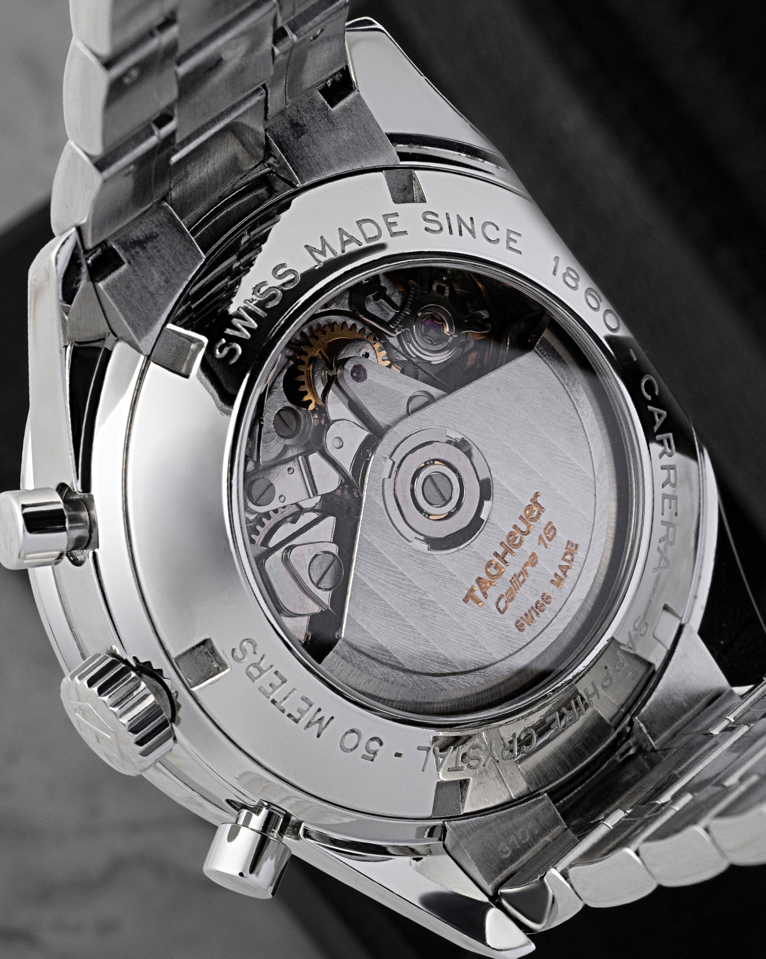 Exhibition sapphire crystal caseback displaying the TAG Heuer Calibre 16 automatic chronograph movement
