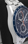 Polished stainless steel case profile and blue aluminum bezel on pre-owned TAG Heuer Carrera Calibre 16