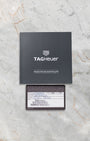 Original TAG Heuer international warranty card and instruction manual booklet included with pre-owned Carrera CV2A10.BA0796