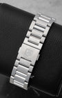 Rear studio view of the stainless steel H-link bracelet and folding clasp with the engraved TAG Heuer shield logo