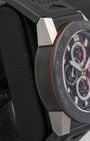 left non-crown profile view of the TAG Heuer Carrera skeleton watch highlighting the modular lug architecture and ceramic bezel rim