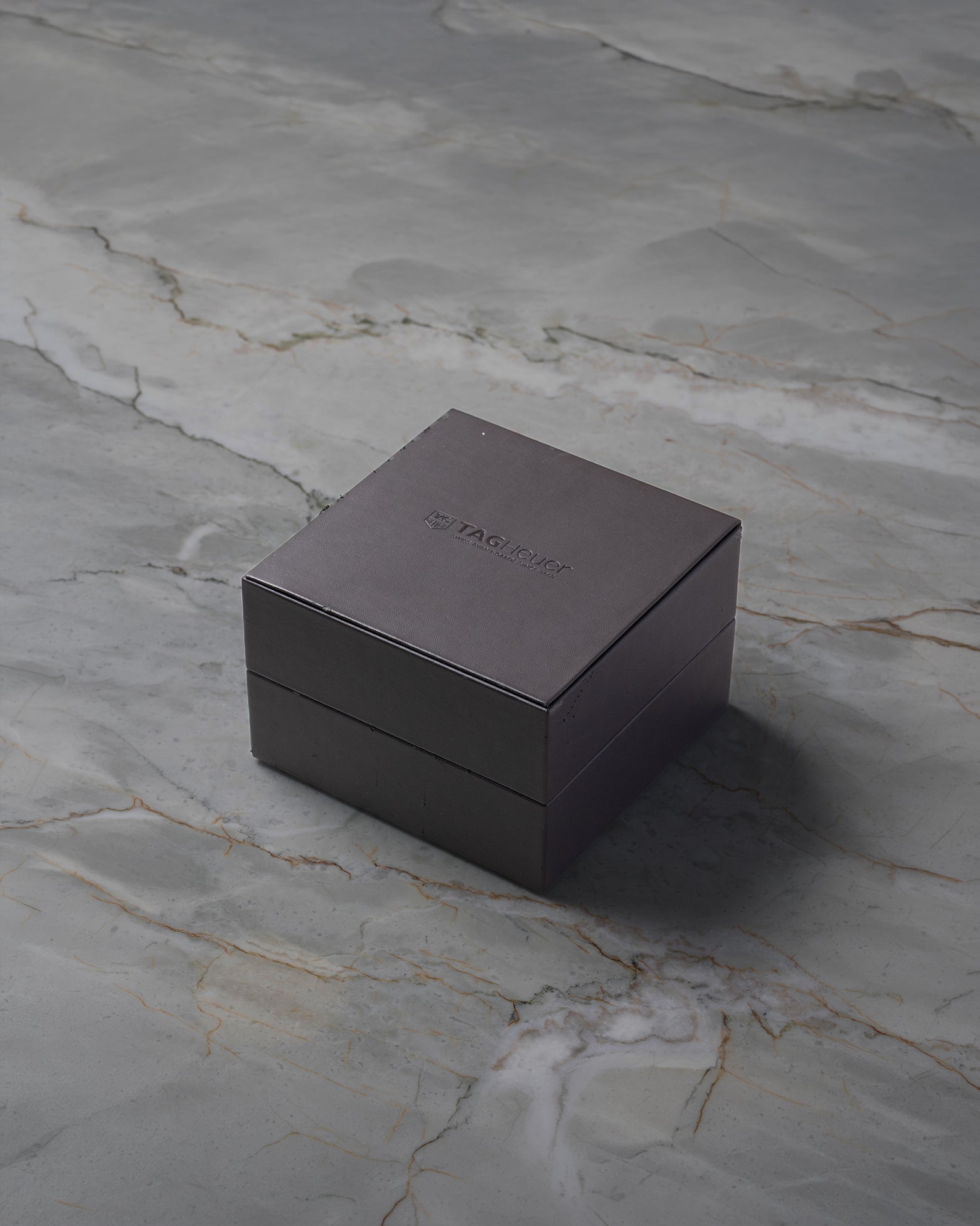 Original TAG Heuer luxury watch presentation box included with pre-owned Carrera Calibre 5 purchase