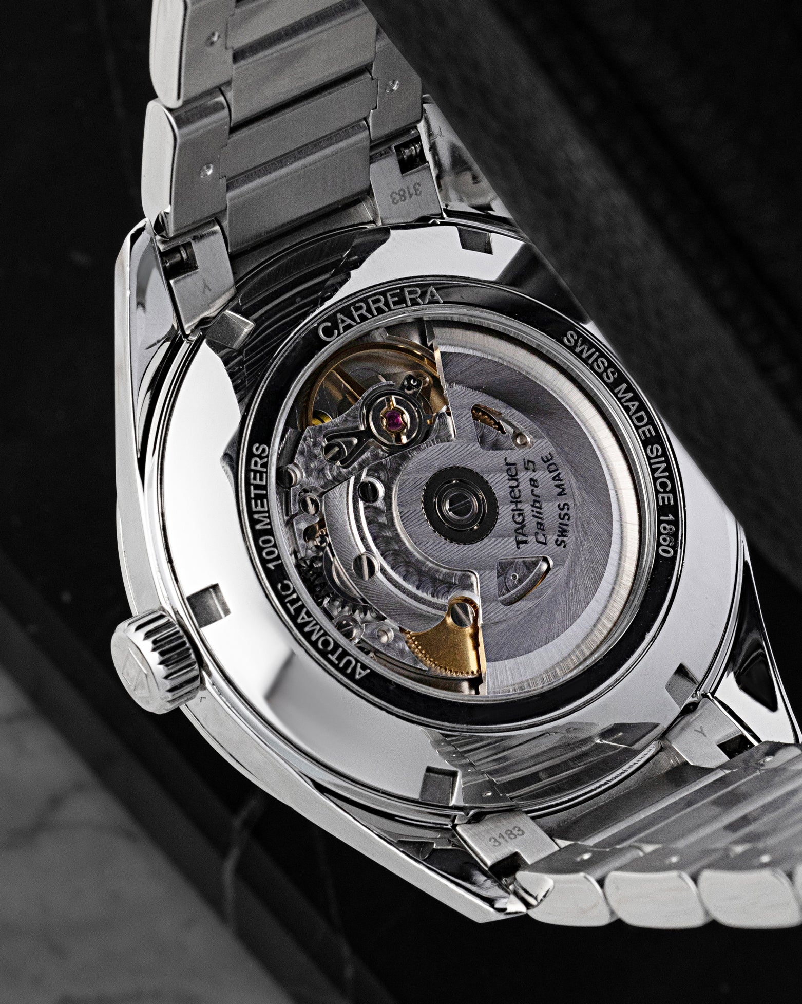 Exhibition sapphire crystal caseback displaying the TAG Heuer Calibre 5 automatic movement