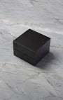 Dark luxury watch presentation box for a TAG Heuer Aquaracer chronograph on display