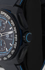 Side profile view of the black sandblasted case showing the racing blue crown ring and integrated sleek chronograph pushers
