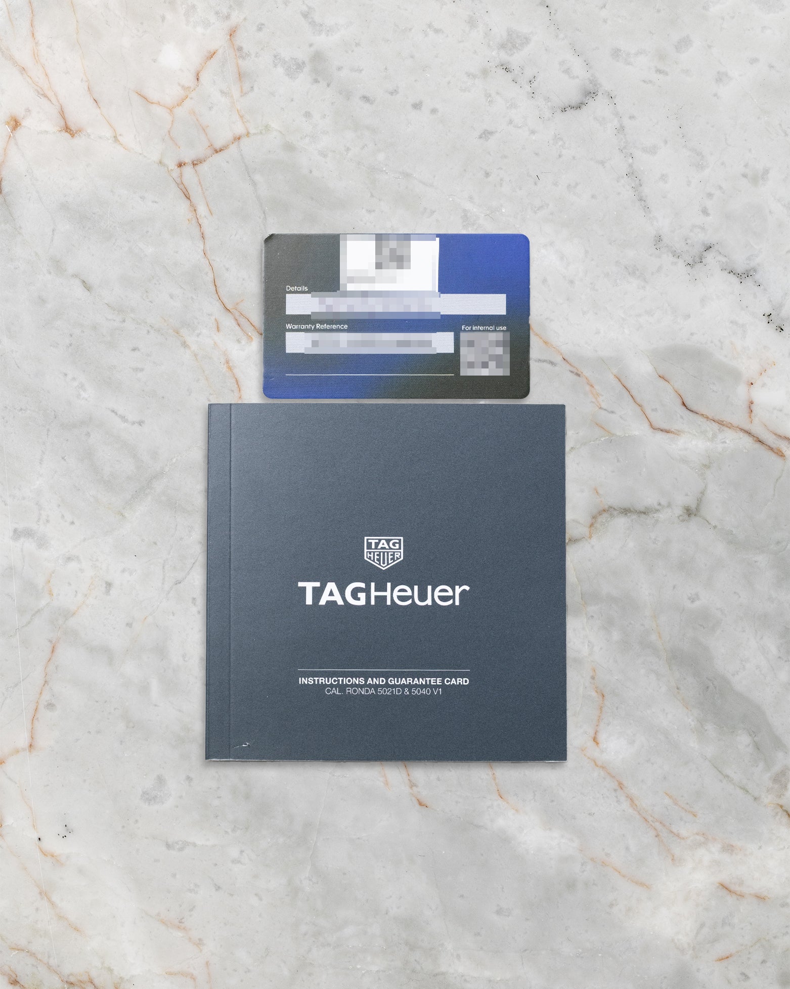 TAG Heuer Formula 1 reference CAZ1014.BA0842 official warranty card and instructional booklet at Noah's Fine Watches & Jewelry