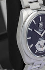 Side profile view of the sculpted stainless steel case on the non-crown side of a TAG Heuer Grand Carrera Calibre 6 RS