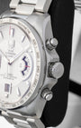 Side profile view of the stainless steel case showing the tachymeter bezel, main crown, and screw-down chronograph pushers.