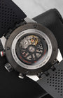 sapphire crystal display caseback of the Carrera watch revealing the skeletonized rotor and column-wheel mechanism of the Heuer 01 caliber