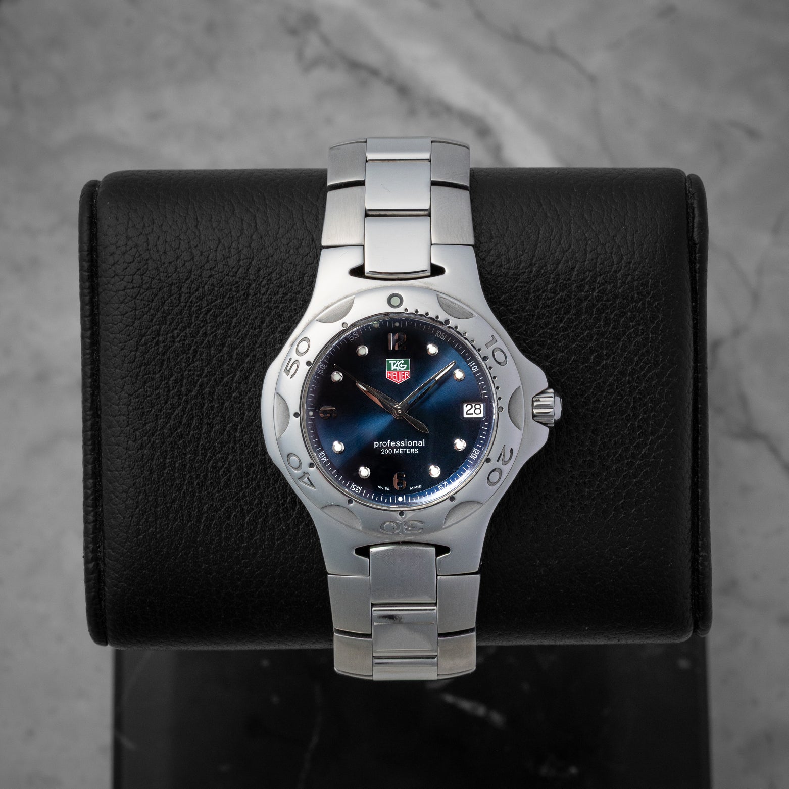 TAG Heuer Kirium Professional 200M quartz 37mm watch with a blue dial, model WL1113, on display at Noah's Fine Watches & Jewelry in Dallas