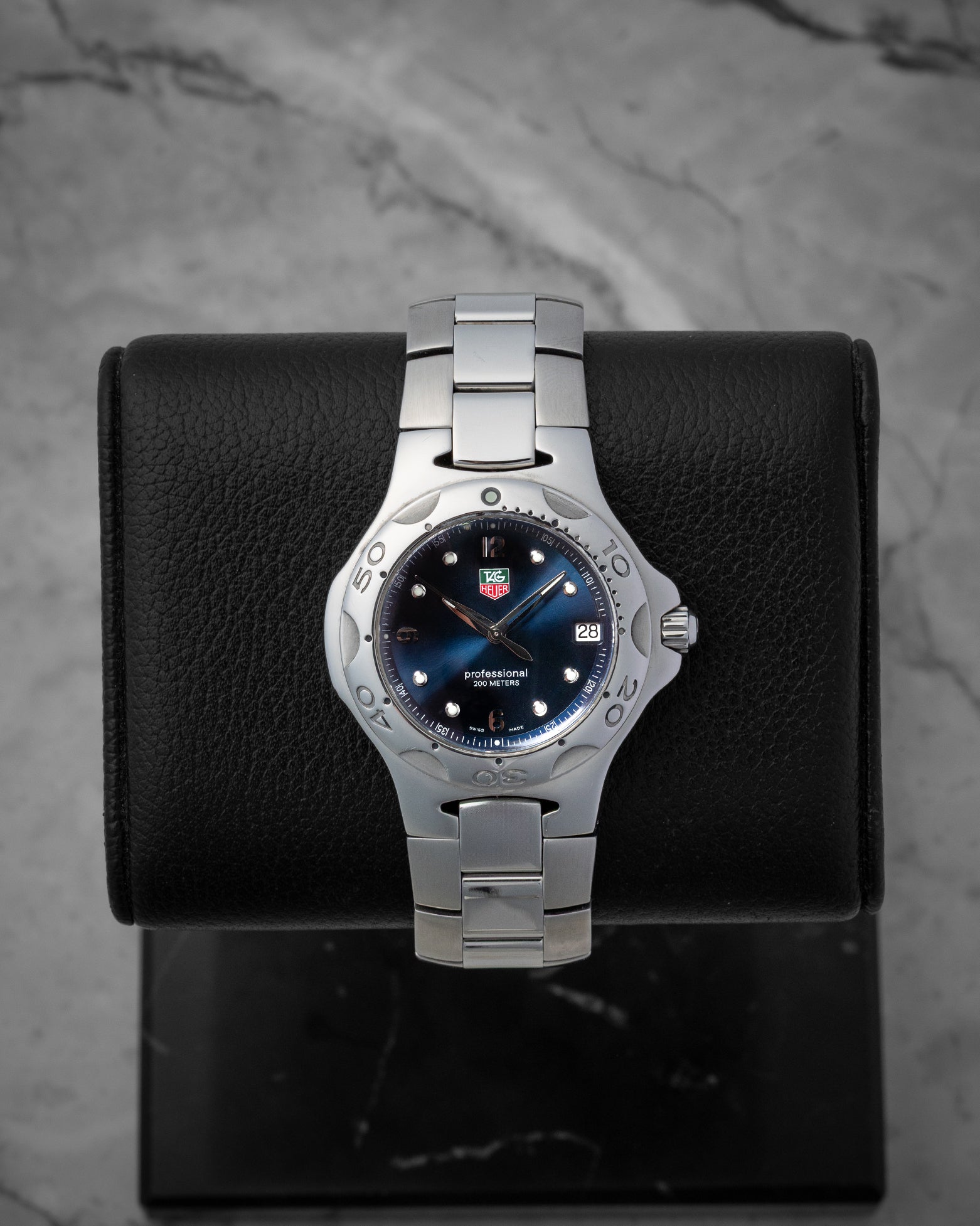 TAG Heuer Kirium Professional 200M quartz 37mm watch with a blue dial, model WL1113, on display at Noah's Fine Watches & Jewelry in Dallas