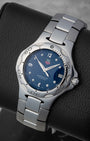 Front angled view of a stainless steel 37mm TAG Heuer Kirium blue dial men's quartz watch in Dallas