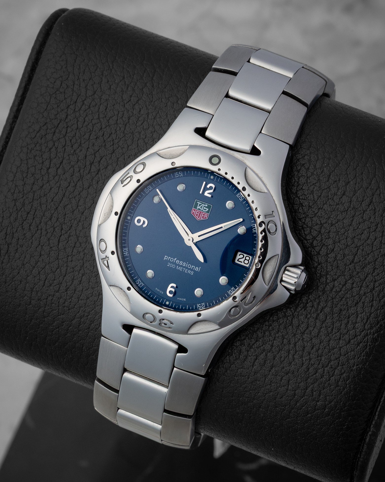 Front angled view of a stainless steel 37mm TAG Heuer Kirium blue dial men's quartz watch in Dallas