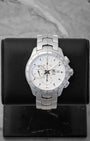 2012 TAG Heuer Link Calibre 16 Automatic Chronograph CAT2011.BA0952 with a silver dial on a black studio display stand