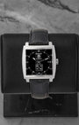 Pre owned TAG Heuer Monaco Calibre 6 WW2110 square black dial watch at Noah's Fine Watches & Jewelry Dallas