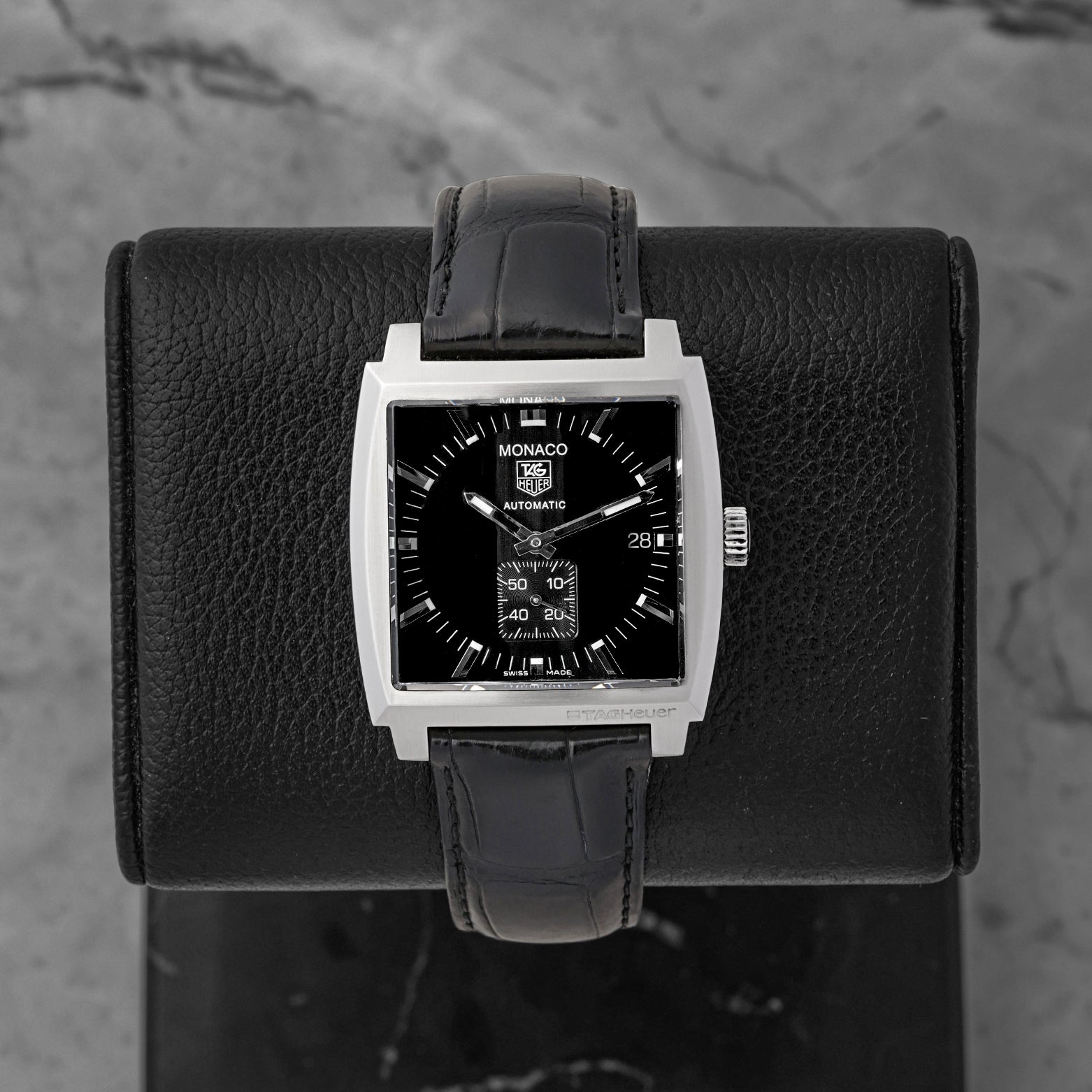 Pre owned TAG Heuer Monaco Calibre 6 WW2110 square black dial watch at Noah's Fine Watches & Jewelry Dallas