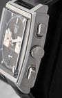 Side profile view showing the stainless steel square case, winding crown, and angled chronograph pushers on TAG Heuer Monaco CBL2113.FC6177
