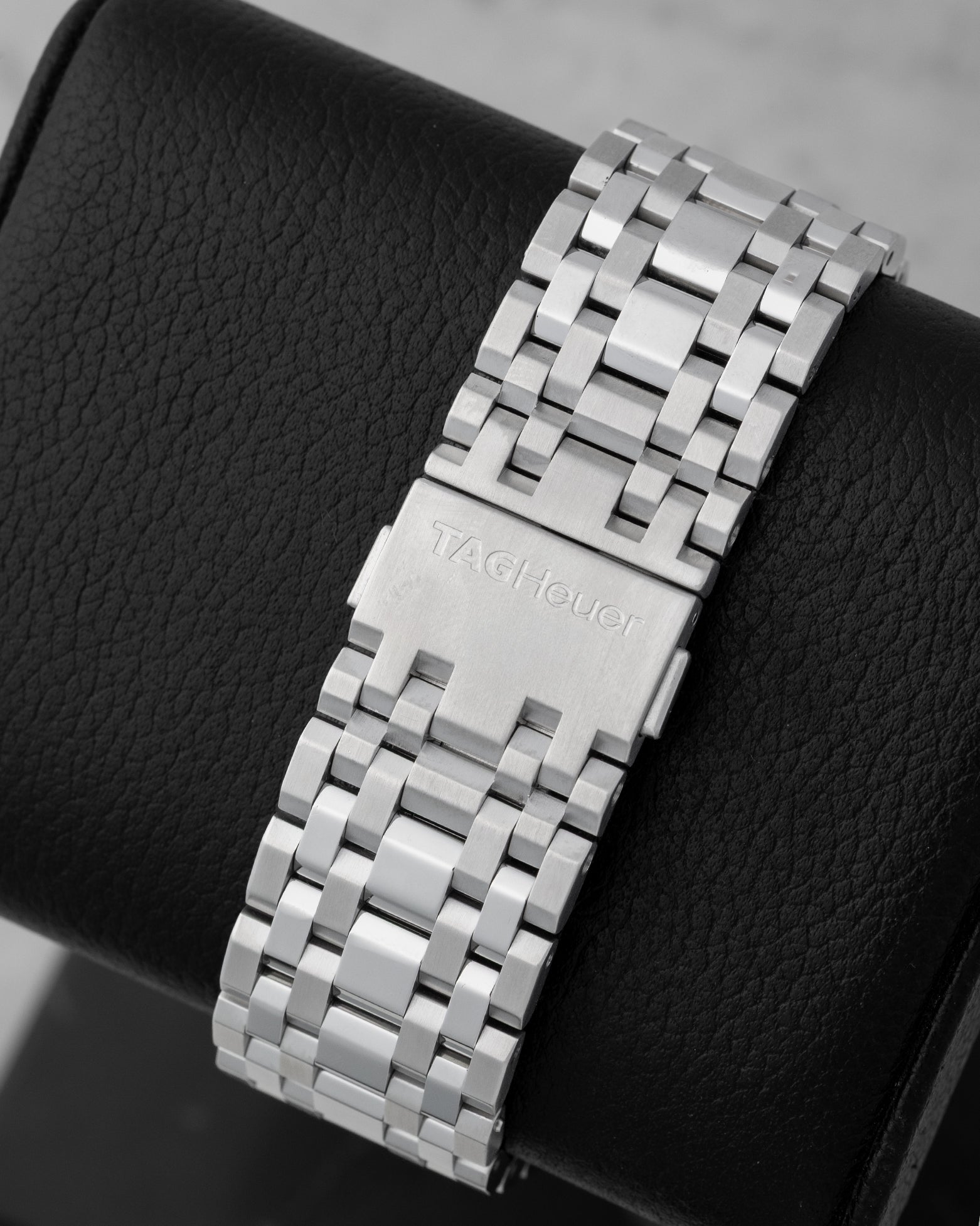 Back view showing the stainless steel multi-link bracelet with folding clasp on a TAG Heuer Monaco CW2113.BA0780