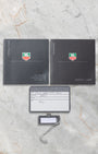 TAG Heuer Monaco CW2113 instruction booklets, guarantee card, and serial number hang tag