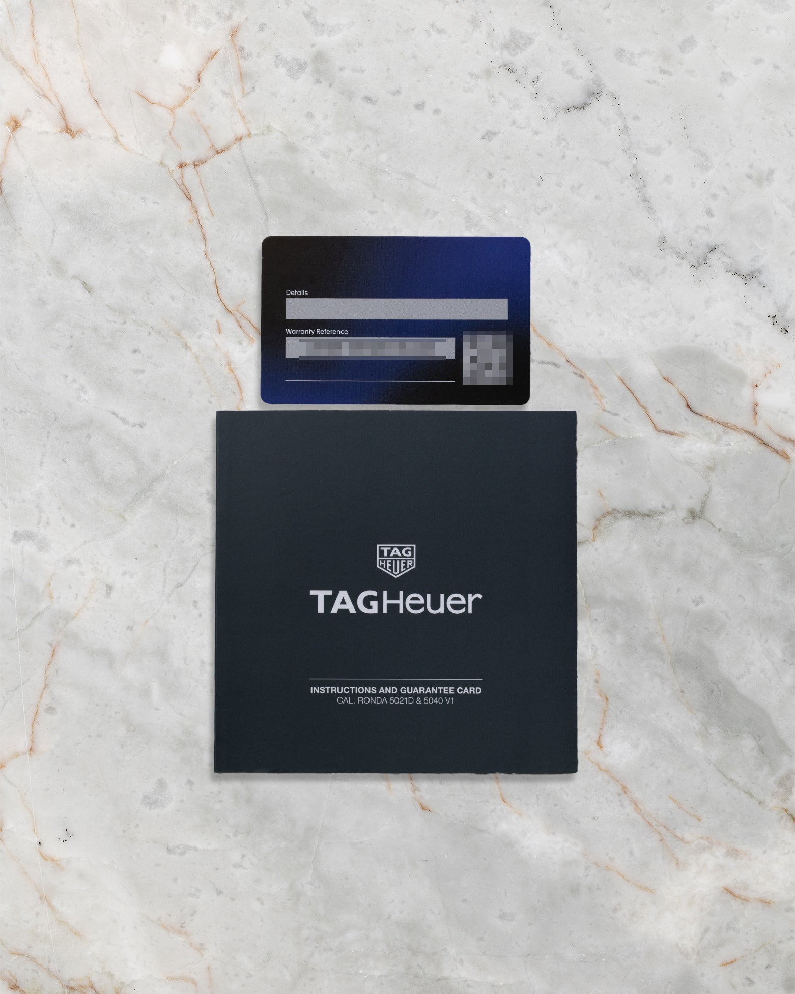 Original TAG Heuer international warranty card and instruction manual booklet for the Monaco Gulf Special Edition reference CBL2115.FC6494.