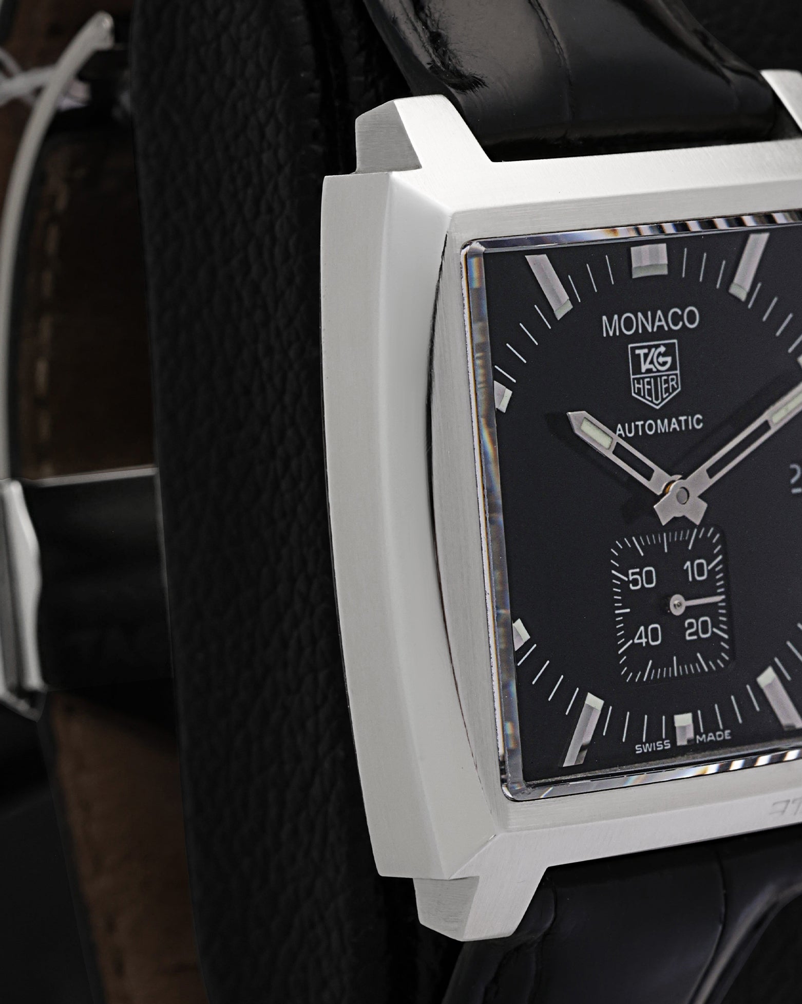 Side profile view of the 37mm square stainless steel case on a TAG Heuer Monaco Calibre 6