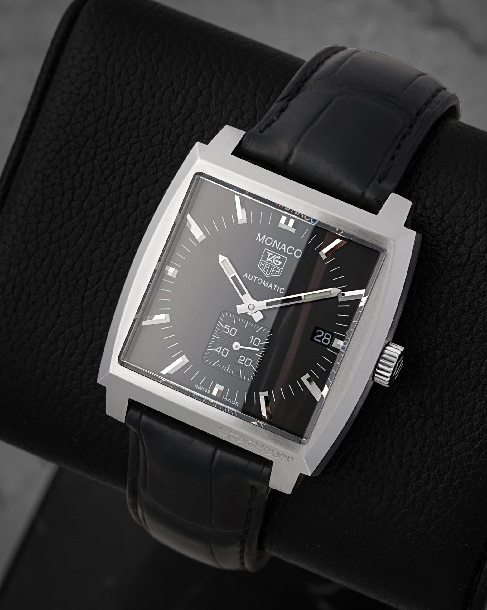 Angled view of TAG Heuer Monaco WW2110 highlighting the square stainless steel case and sub-second register