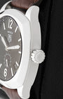 Close-up side view of the polished stainless steel cushion case and crown on a TAG Heuer Monza Calibre 6 WR2110
