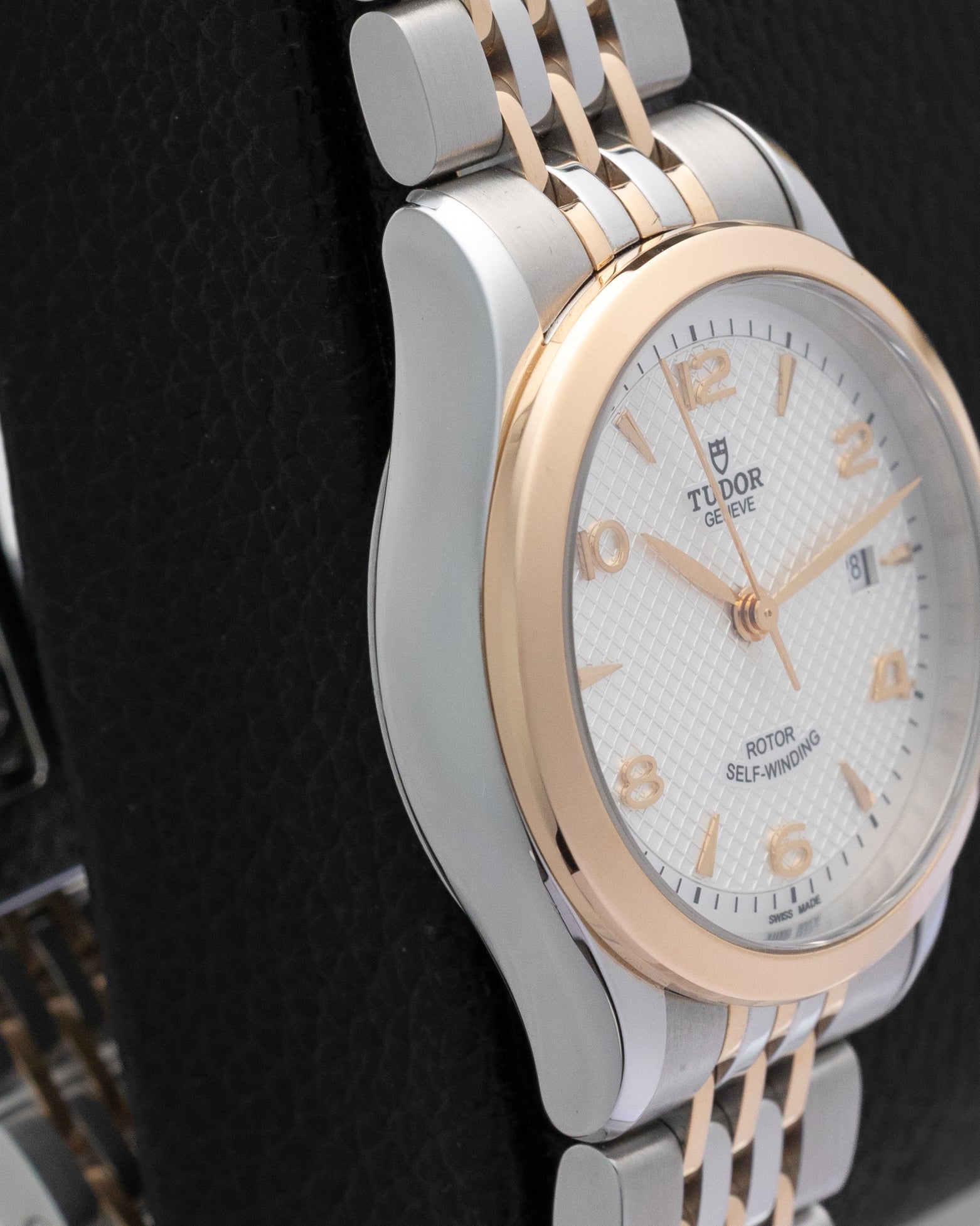 Left side profile view highlighting the polished 28mm stainless steel case and slim profile of the pre-owned 2024 Tudor 1926 M91351.