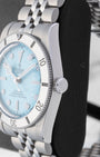 stainless steel case profile view showcasing the coin-edge bezel and screw-down crown with the Tudor rose in relief on a 37mm Black Bay 54