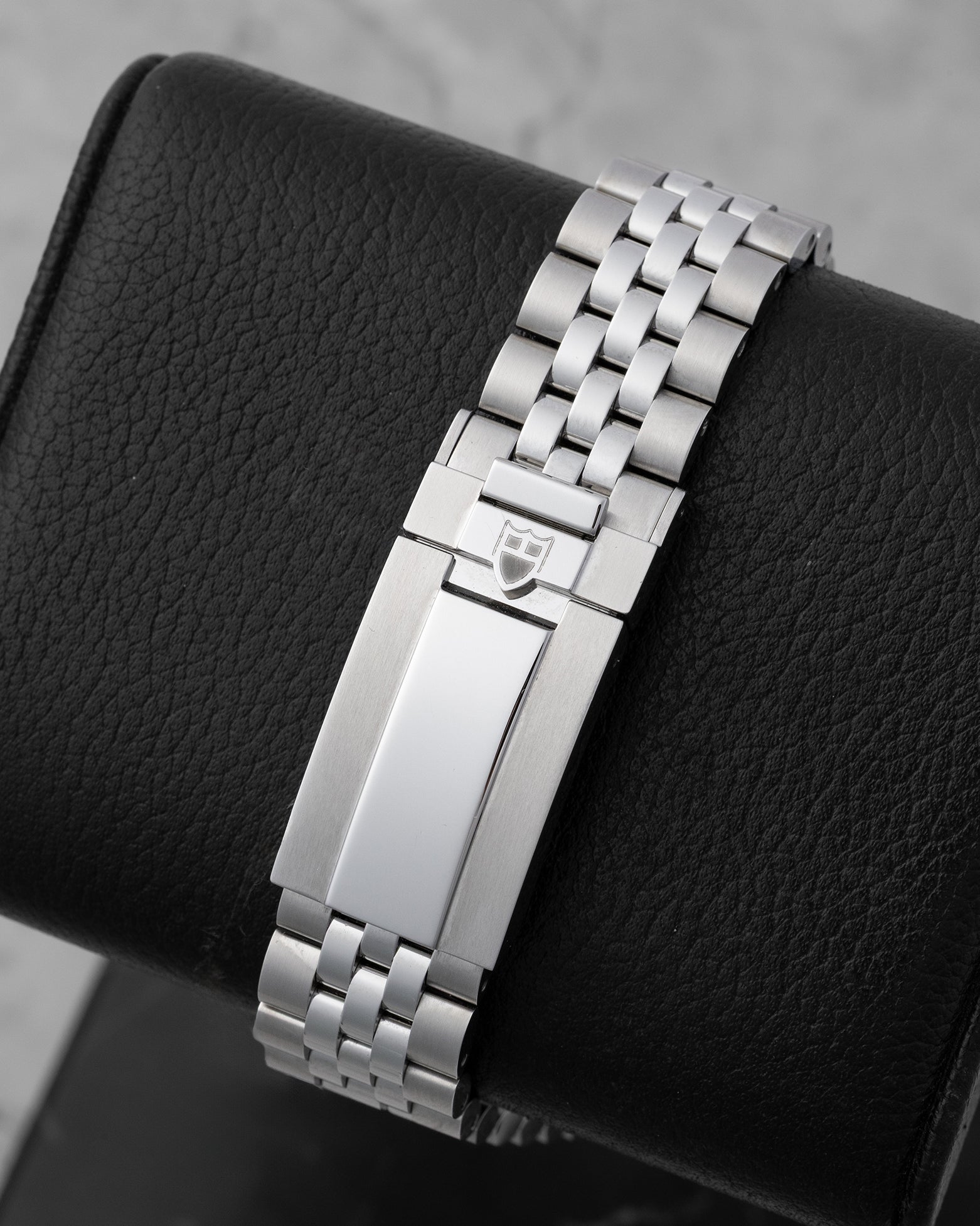 Rear view of the five-link stainless steel watch bracelet showing the folding safety deployment clasp featuring the integrated Tudor T-fit micro-adjustment mechanism