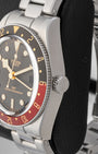 Close-up right profile view of the steel Tudor Black Bay 58 GMT case highlighting the coin-edge bezel and screw-down crown
